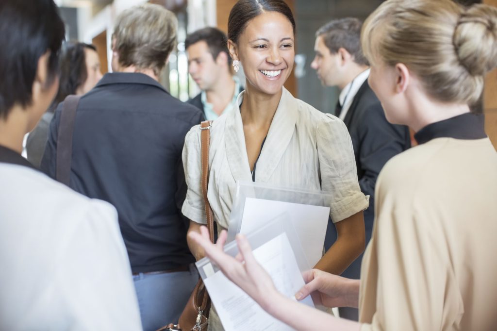 Women networking at a professional leadership event