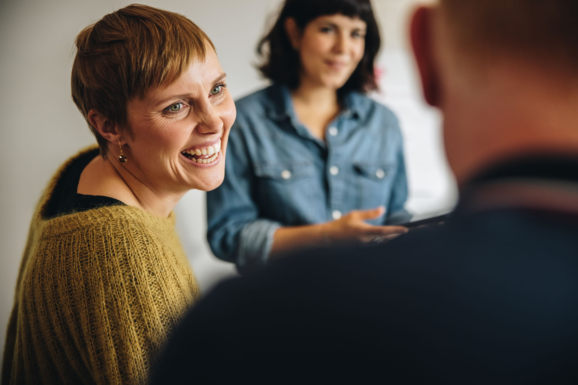 Women participating in an open workplace discussion